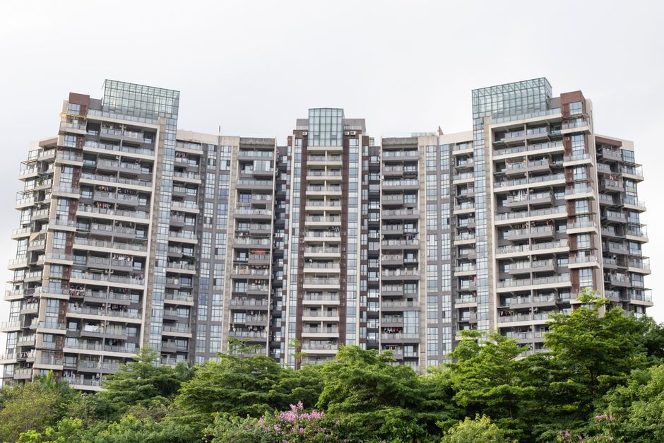 modern residential tower facade greenery architecture