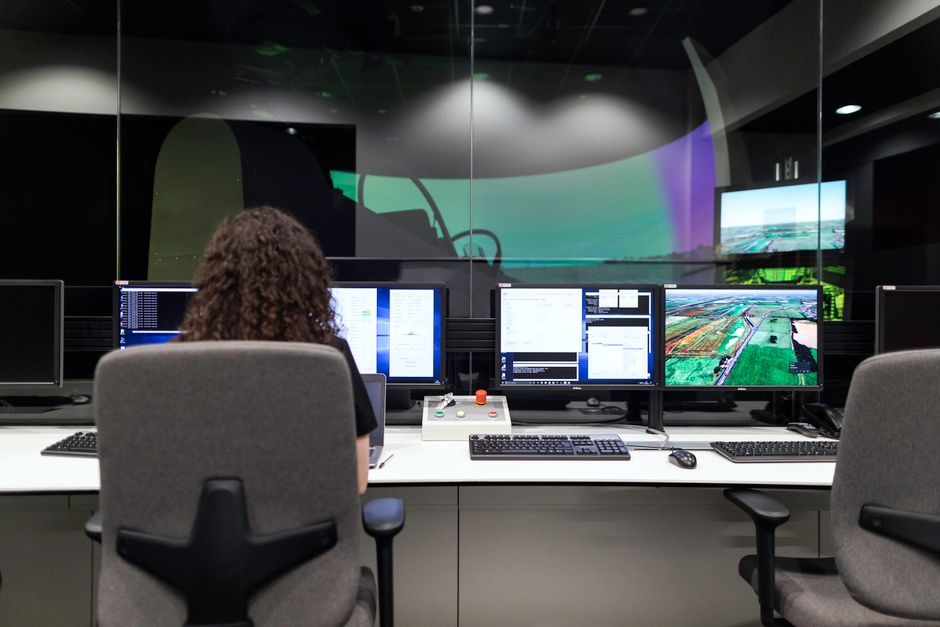 engineer reviewing computer simulation data