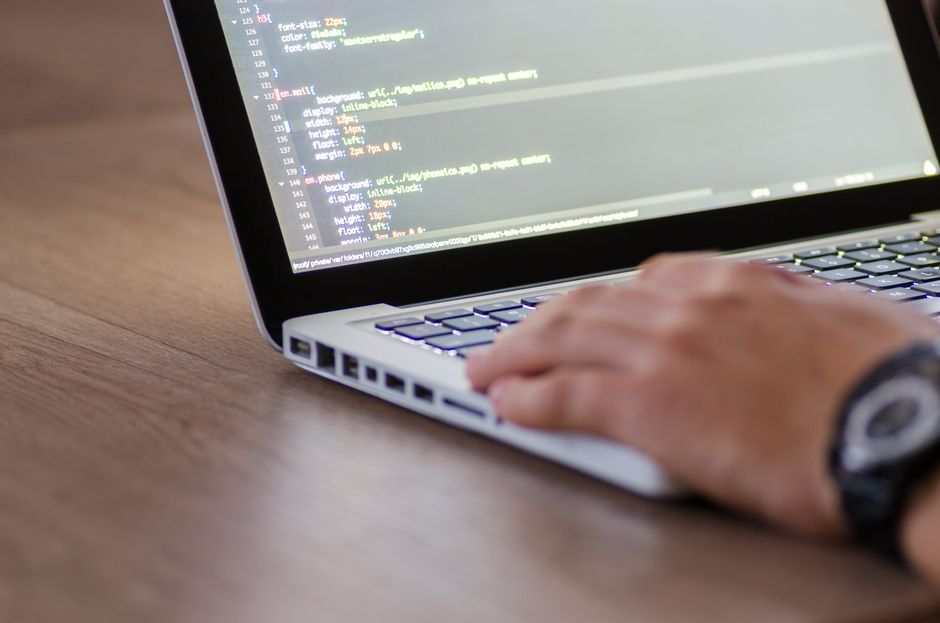 developer programming code laptop screen