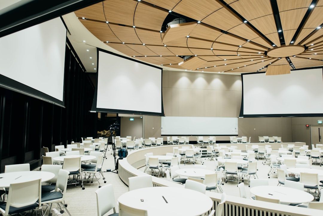business conference speaker presentation screen daytime