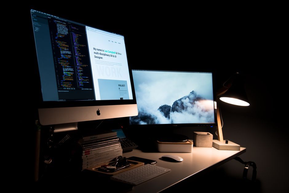 software developer coding workspace dual monitors no logo