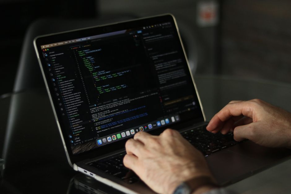 software developer debugging laptop