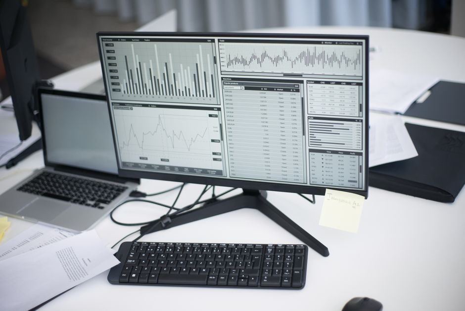 modern office workspace computer analytics display