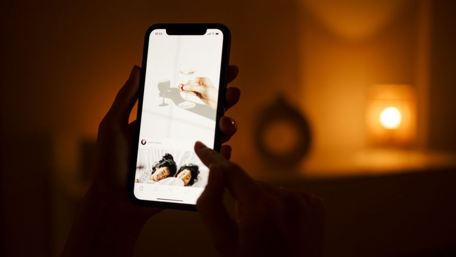 person browsing smartphone digital content