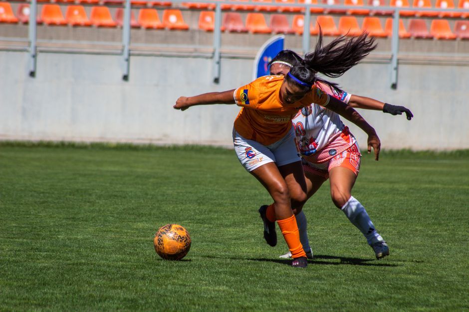 professional female football player action soccer match