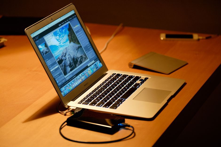 travel technology software interface laptop notebook computer office desk workspace