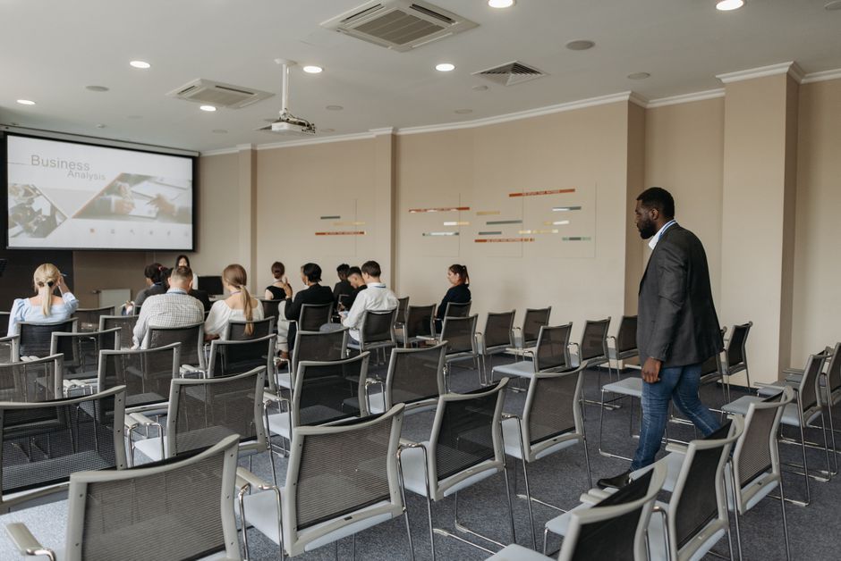 business conference seminar audience presentation screen daytime