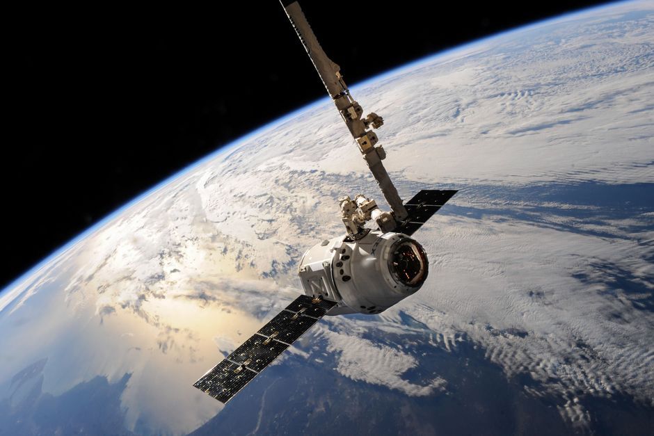 tiny cubesat satellite in space orbit