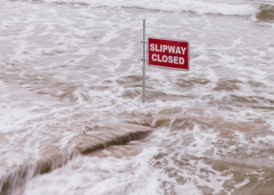 UK coastal flooding storm waves street Scotland