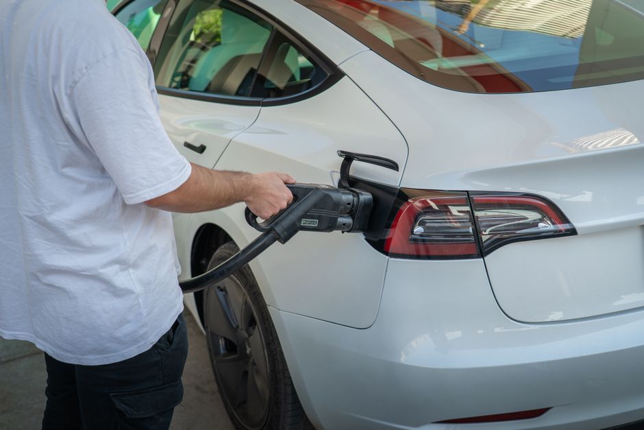 Tesla Model 3 charging station door handle