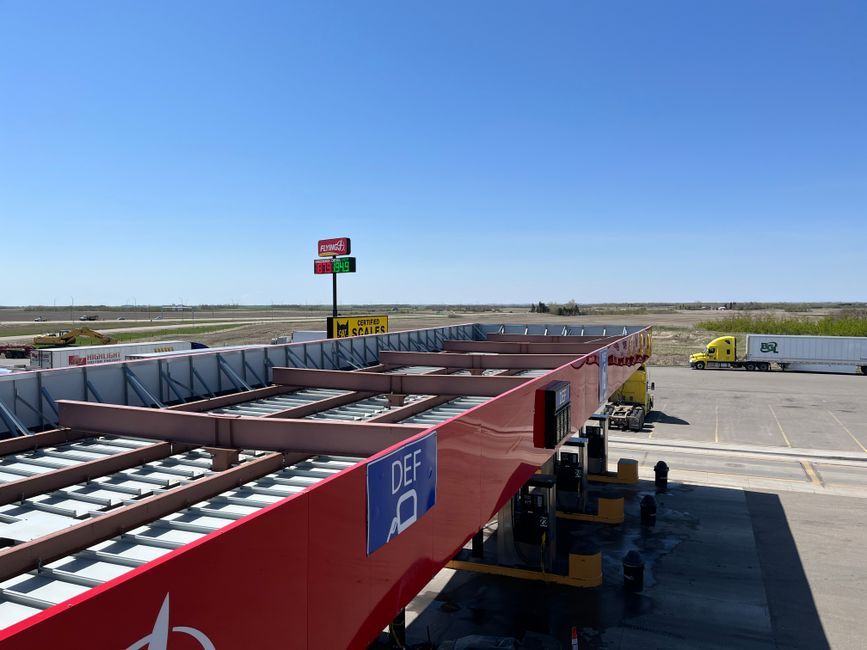 electric truck charging station highway daytime