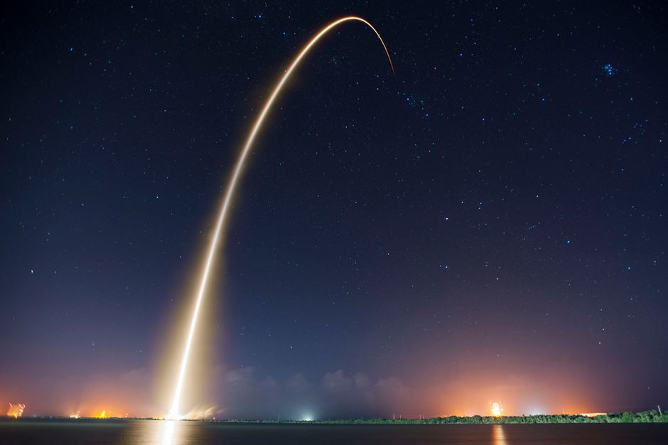 space rocket launchpad night
