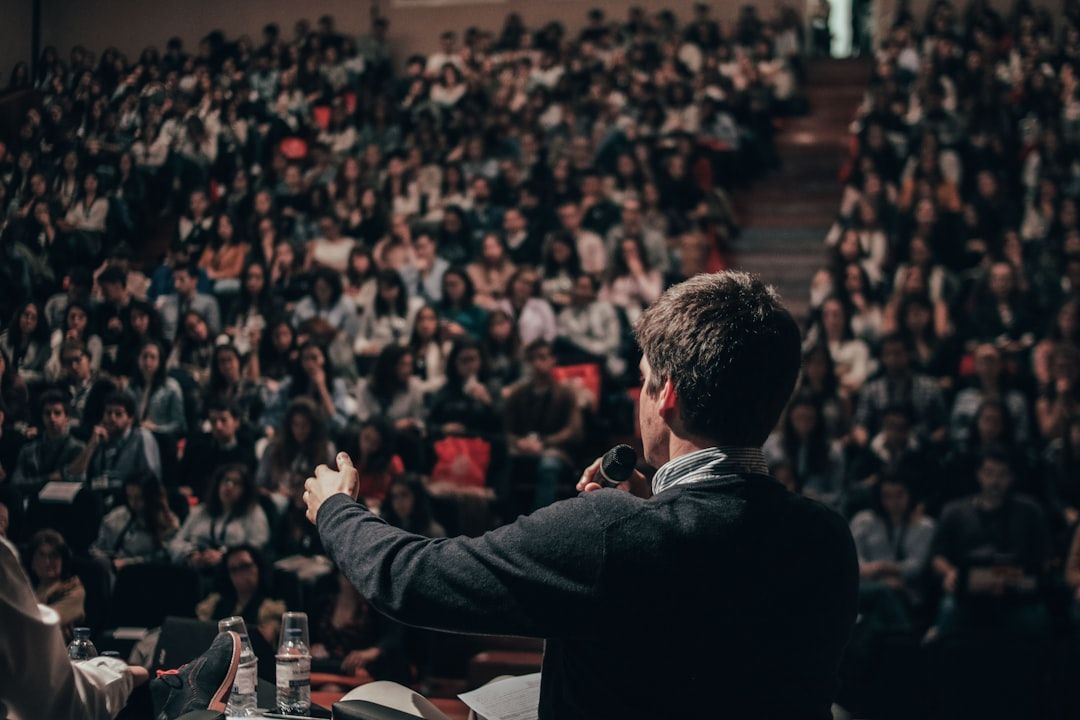 business conference speaker presentation screen daytime