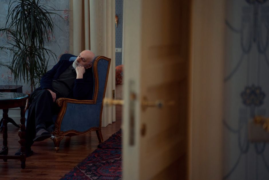 lonely person sitting alone quiet room interior
