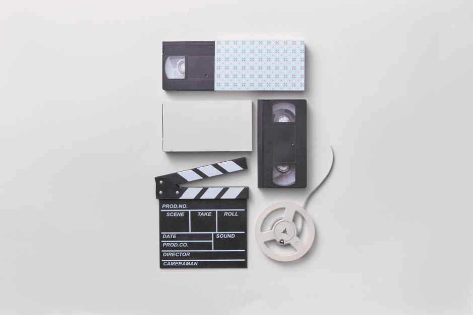 film reel movie production set clapperboard