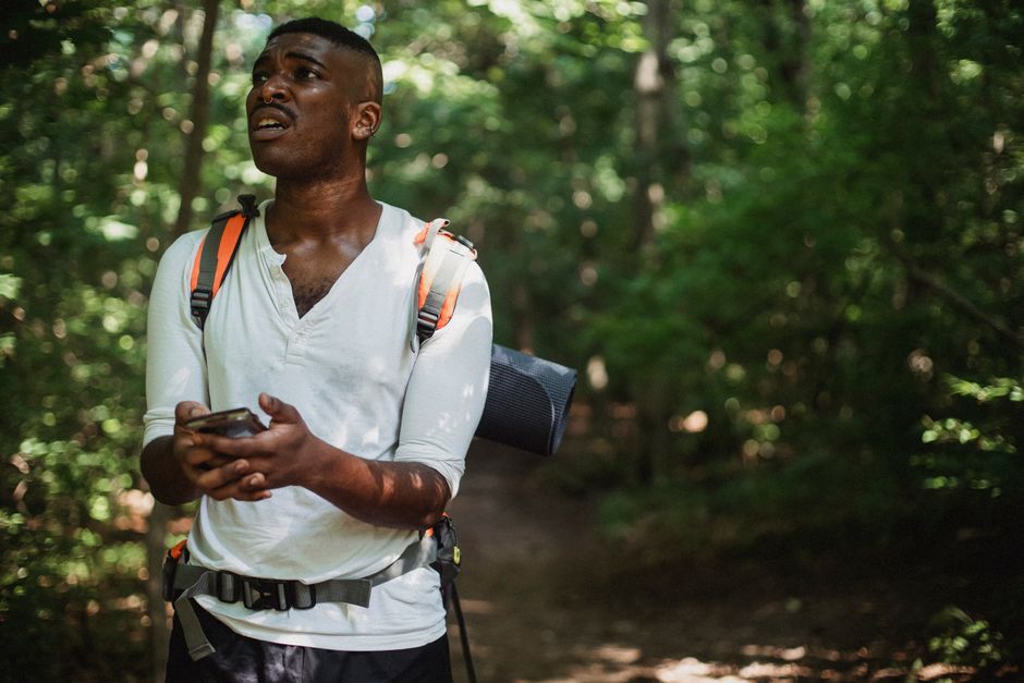 smartphone navigation device in backpack outdoor