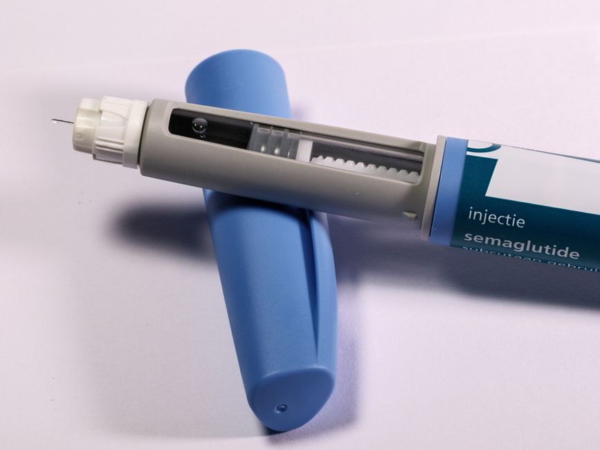 weight loss medication pen injection close up