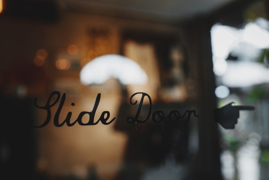 cafe entrance glass sliding doors mosaic floor