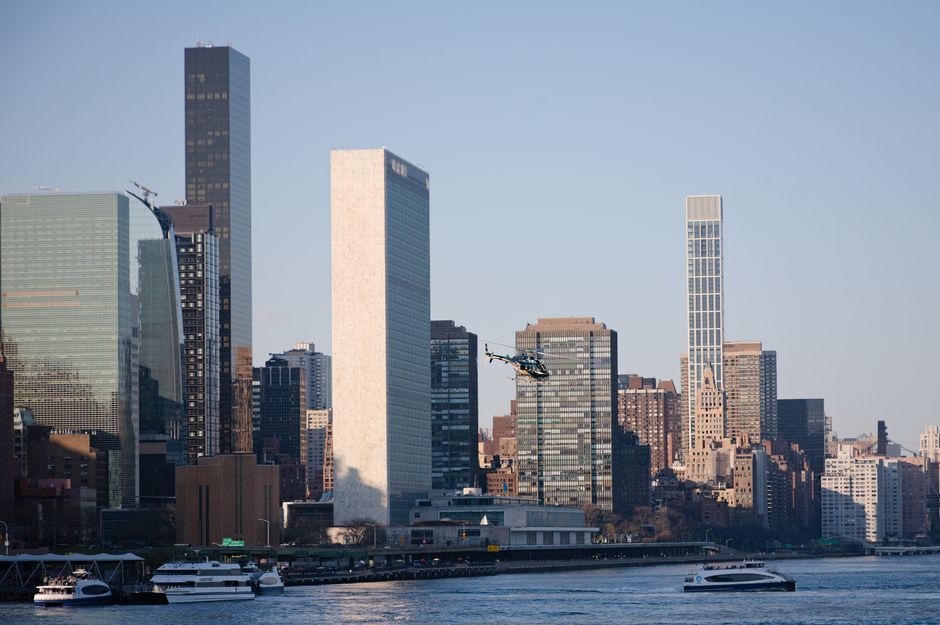 UN headquarters building New York flag