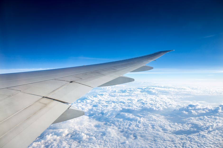 commercial aircraft airplane wing in flight