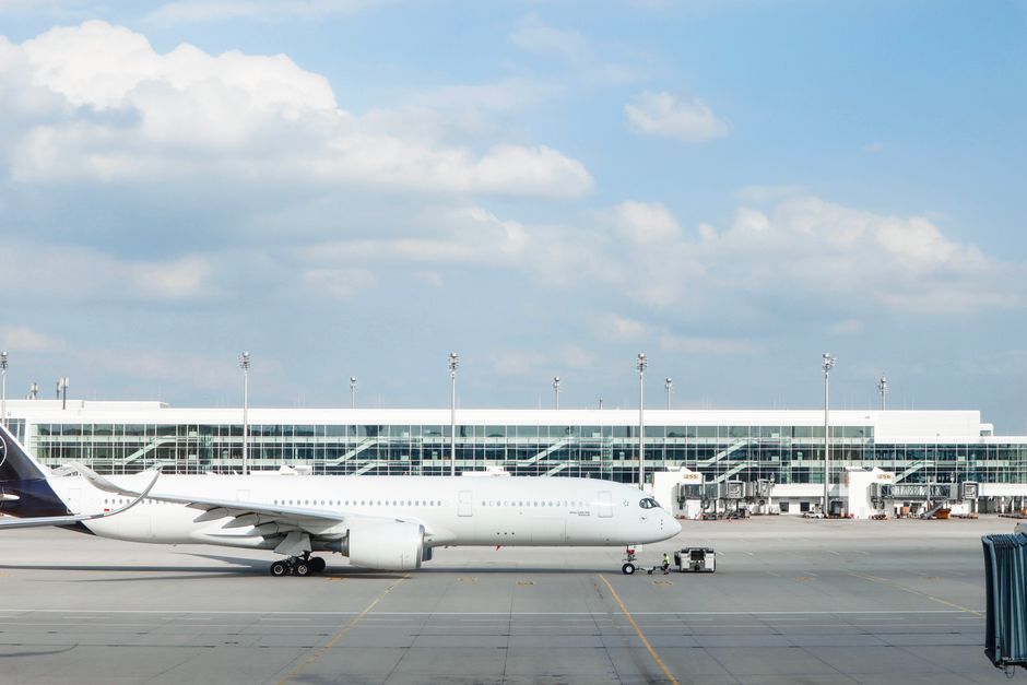 airplane parked at airport gate