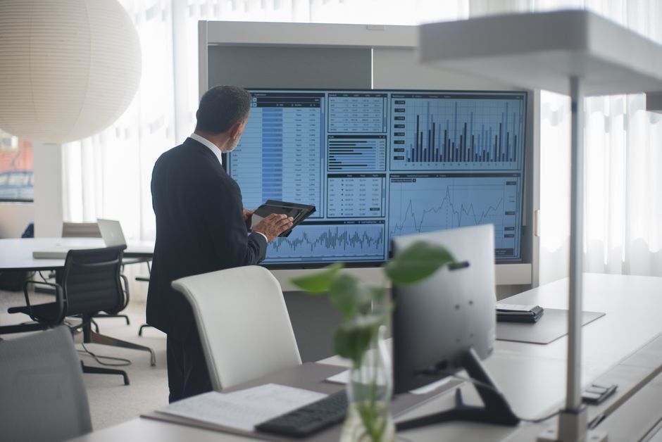 corporate venture capital business office meeting room financial data