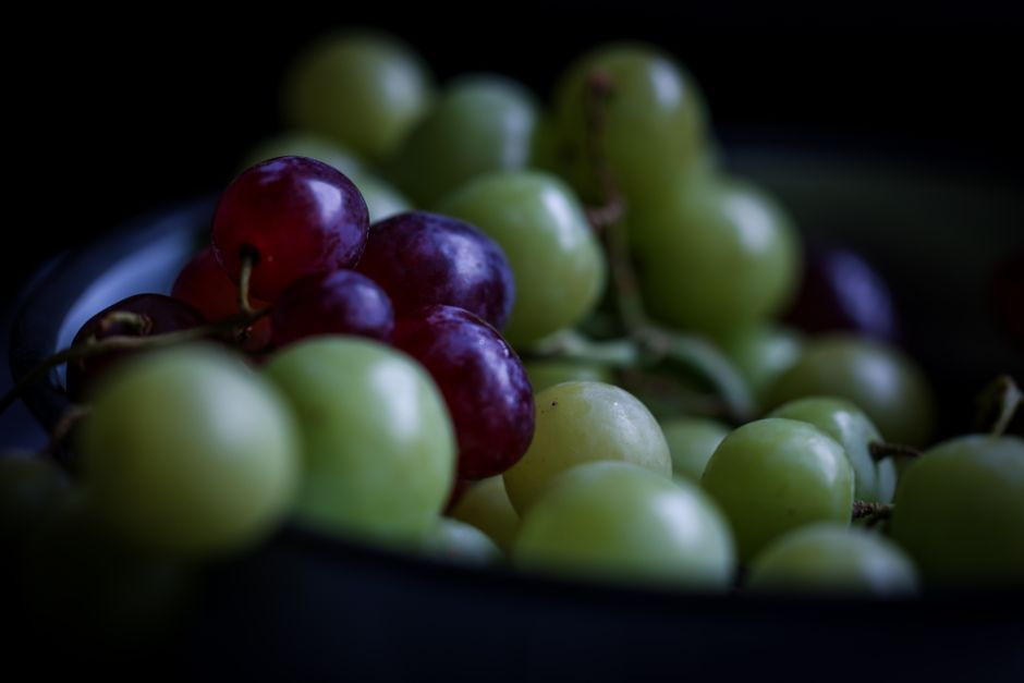 close up fresh red and green grapes