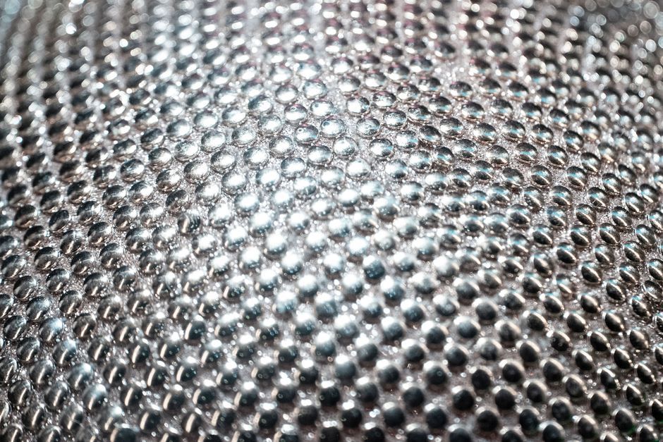 modern steel sphere chair design detail
