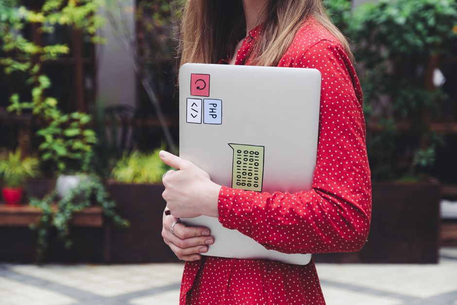student coding web design laptop
