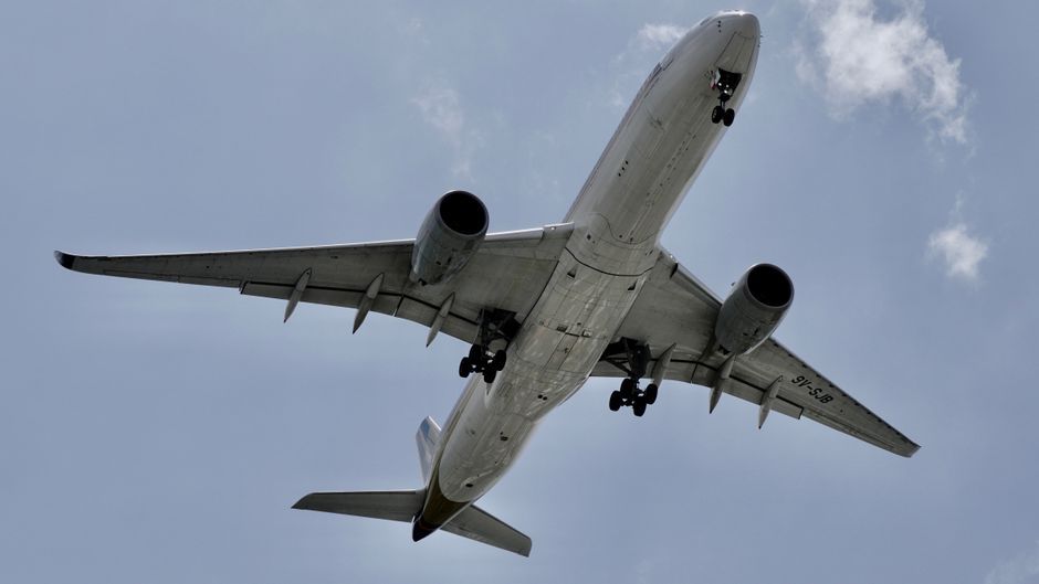 commercial airplane passenger jet flying sky