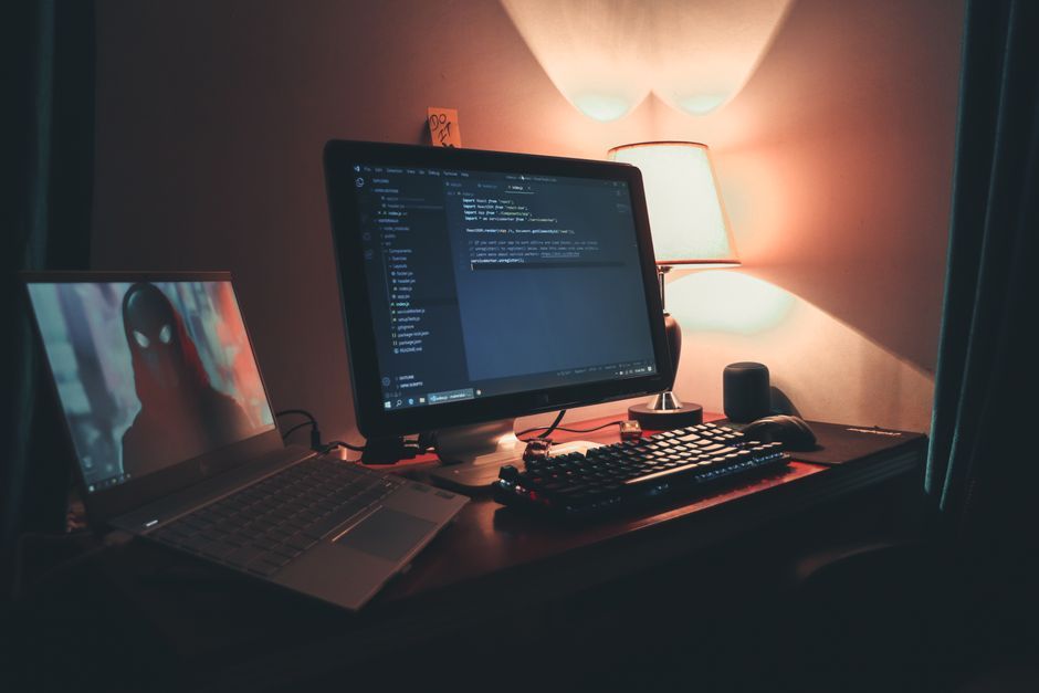 game developer office workspace computer screen
